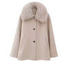 chic and elegant beige cape-style coat